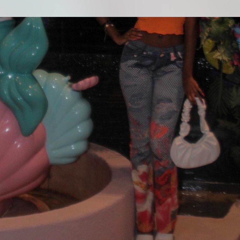 SHEIN Orange Top with Patterned Jeans